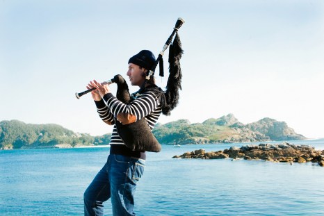 Galician piper Carlos Nunez at Cies Islands, Vigo, Spain